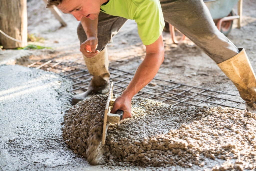 Repairing Cracks in a Concrete Driveway - concrete repair by cement and concrete contractor