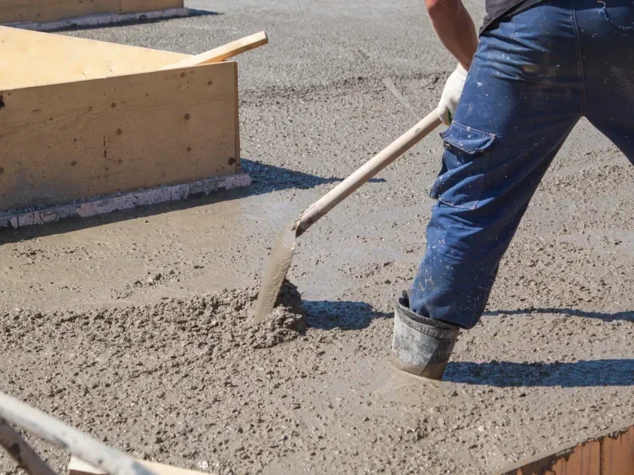 concrete contractor in Ann Arbor laying down concrete slab